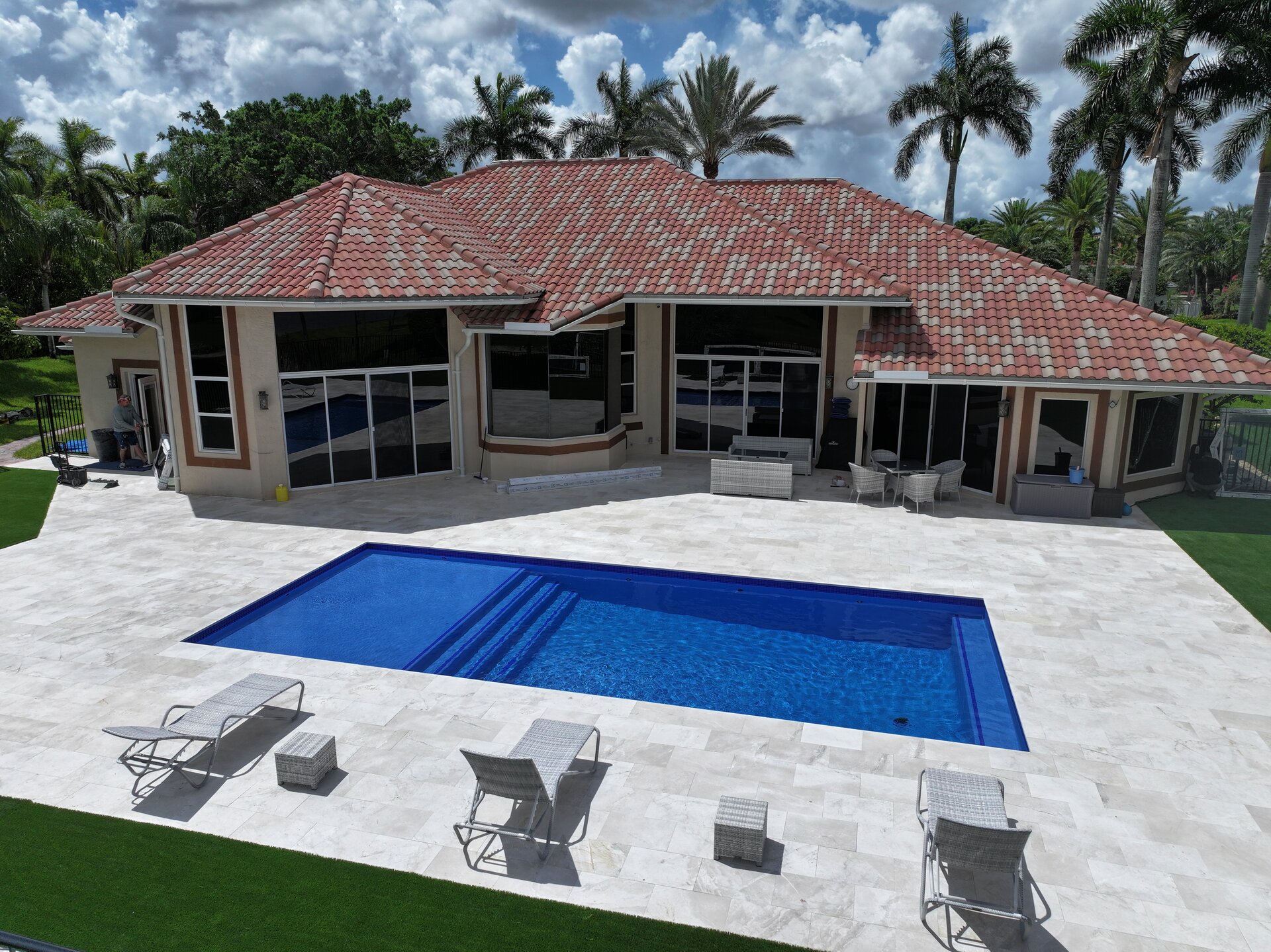 Aerial view of South Florida home with completed tile roof replacement